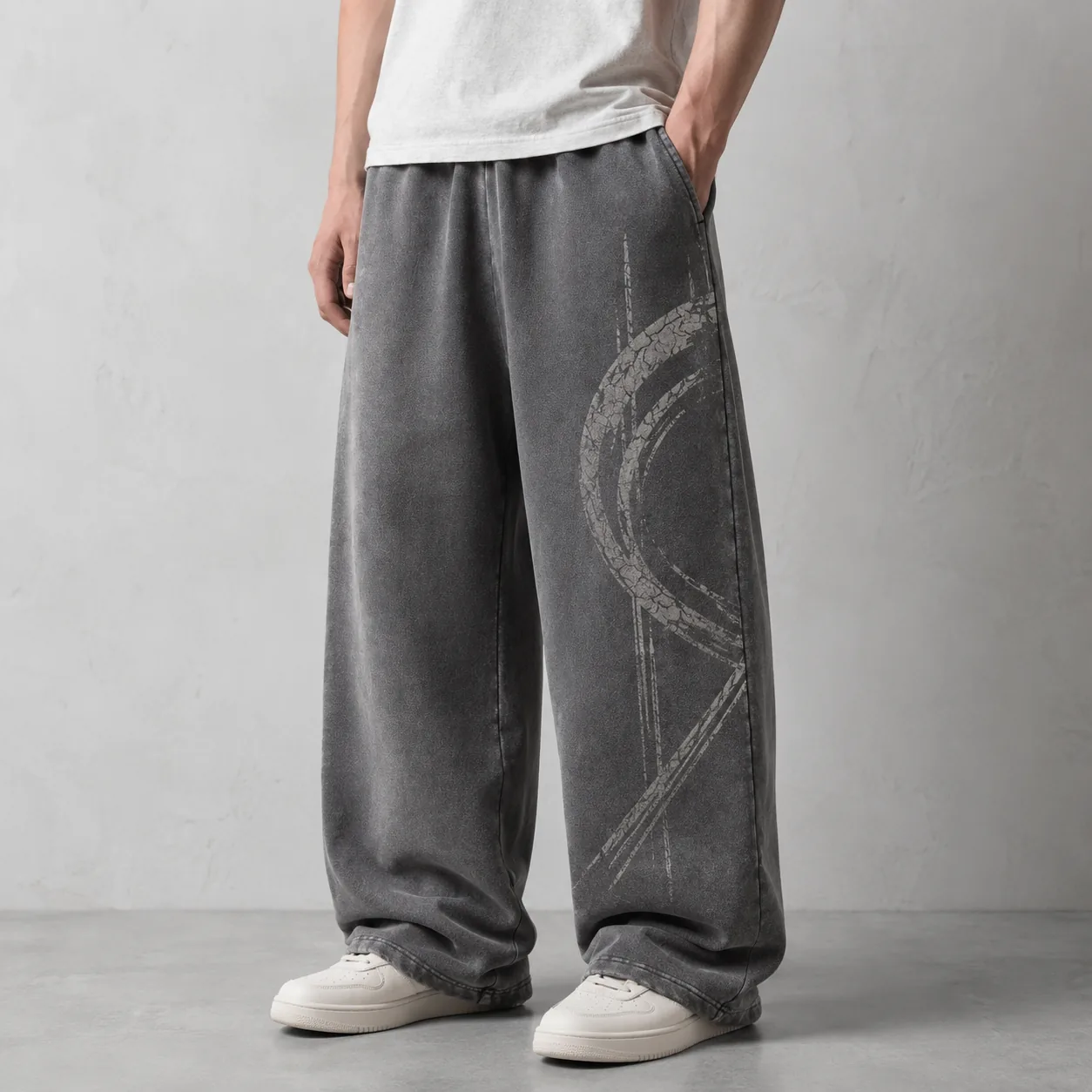 Model wearing dark grey 430GSM wax-dyed washed cotton wide-leg joggers